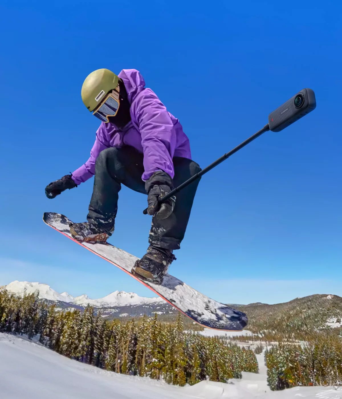 Snowboardeur en action sur piste enneigée.