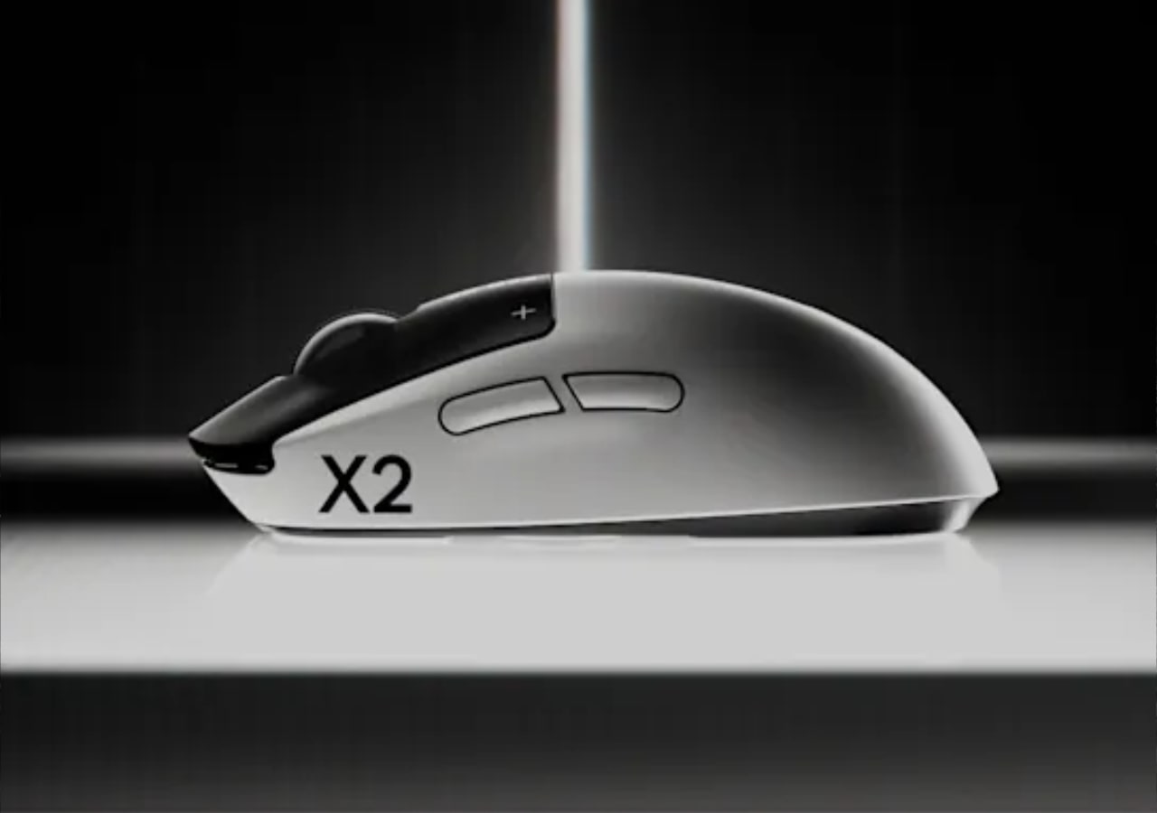 Souris X2 blanche sur fond sombre.